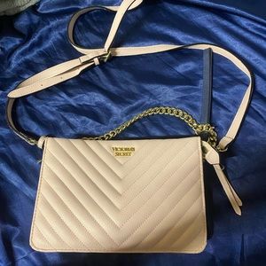 Victoria’s Secret light pink purse. Adjustable straps. Only used a few times.